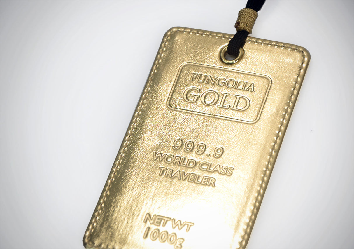<A 000a001a99a1> Fungolia Gold Luggage Tag